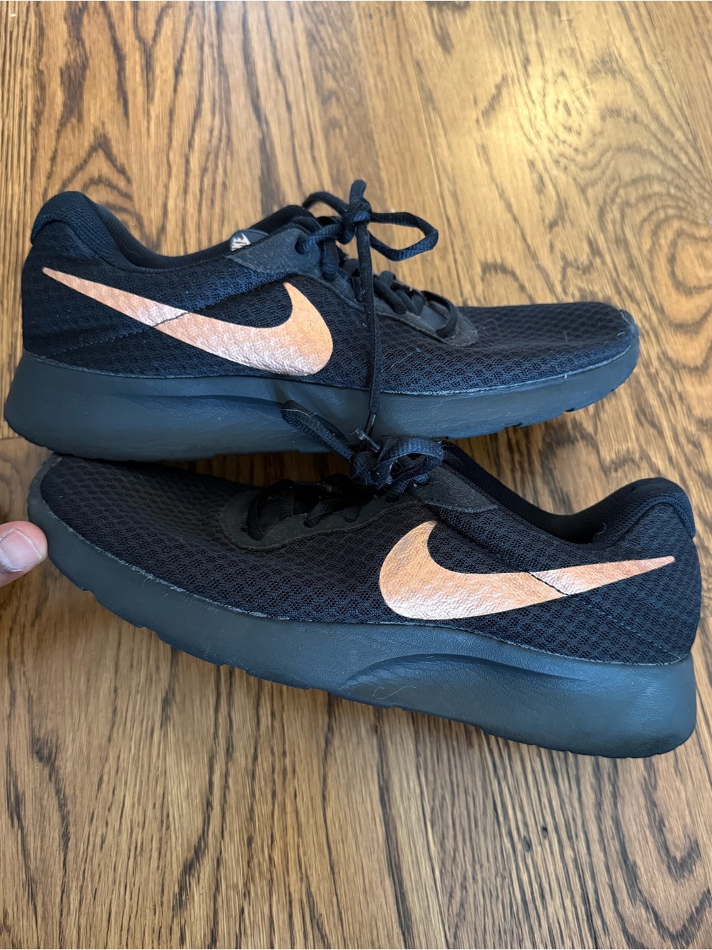 Nike Tanjun black women’s 11 Black Trainers with Copper Swoosh Accents